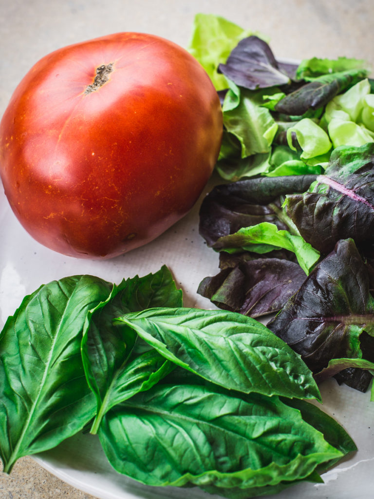 Homegrown tomato, red butter lettuce and garden-fresh basil